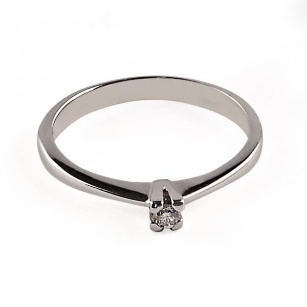 14 karátos fehér arany brill gyűrű. Tisztasága és színe a nemzetközi besorolás szerint: vs,g, nagysága 0,1ct.