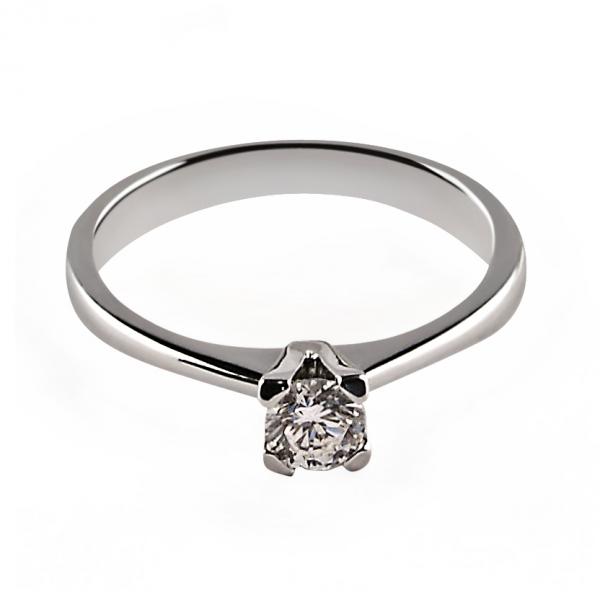 14 karátos fehér arany brill gyűrű. Tisztasága és színe a nemzetközi besorolás szerint: vs,g, nagysága 0,30ct.