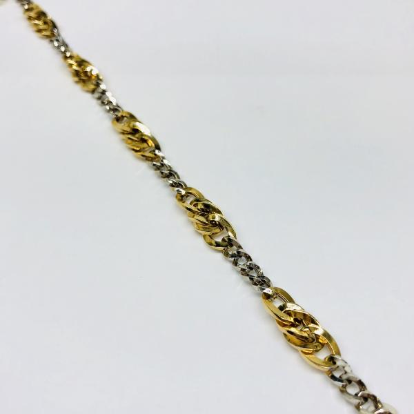 14 karátos sárga-fehér arany karlánc. A karlánc súlya 4,8gr.