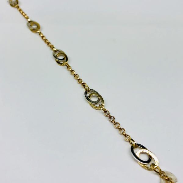 14 karátos sárga-fehér arany karlánc. A karlánc súlya 3,5gr.