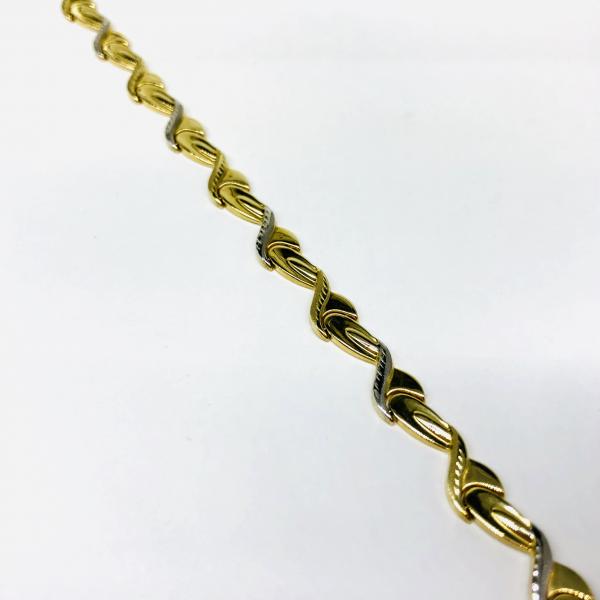 14 karátos sárga-fehér arany karlánc. A karlánc súlya 4,8gr.