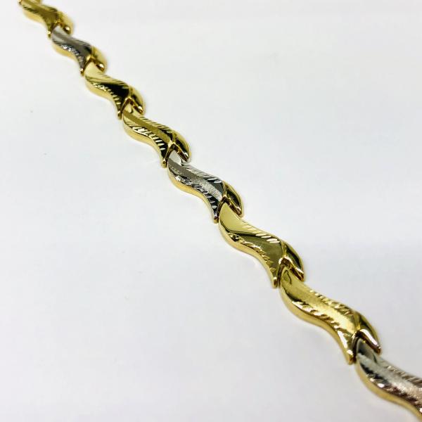 14 karátos sárga-fehér arany karlánc. A karlánc súlya 5,5gr.