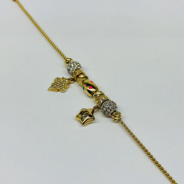 14 karátos sárga-fehér cirkónia köves arany karlánc. A karlánc súlya 6,4gr.