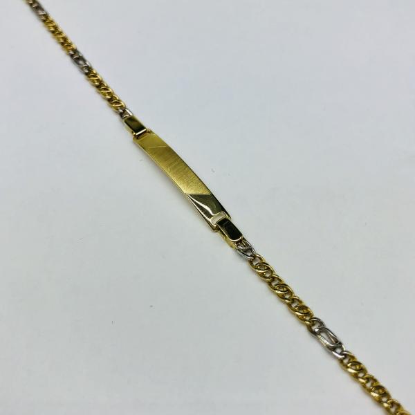 14 karátos sárga-fehér arany karlánc. A karlánc súlya 2,1gr.