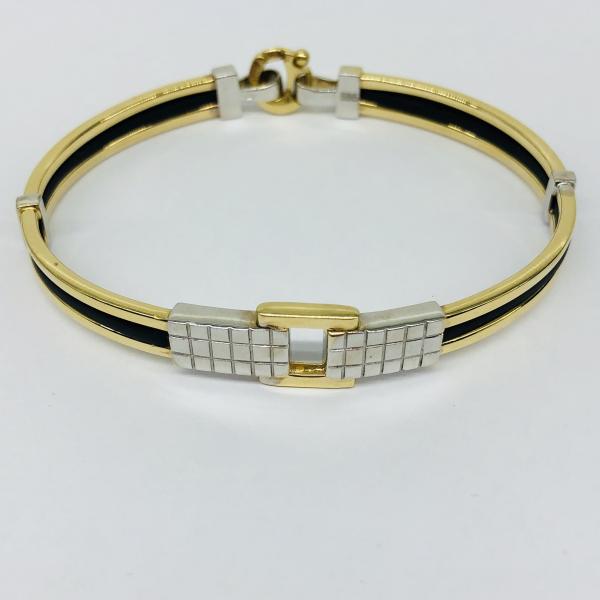 14 karátos sárga arany karlánc kaucsukkal. A karlánc súlya 13,7gr.