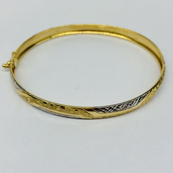 14 karátos sárga-fehér arany reif. A reif súlya 4,2gr.