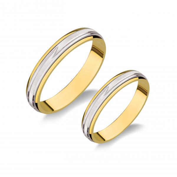 Kétszínű: sárga, fehér. Felülete matt és fényes. A fehér rhodiummal van bevonva. Gépi vésett. A fehér pánt elforog a sárga sínben. Belül sima.