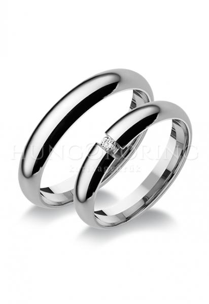 Különleges öntési eljárással, forrasztás nélkül készül! Választható egy színből: fehér, sárga, vörös. Felülete matt vagy fényes. Tetszés szerinti kövezéssel (cirkónia vagy brill). Kívül, belül finoman hajlított (domború). A gyűrűk szélessége 4 mm.
Átlag súly (egy párra értendő) 8,8 gr.